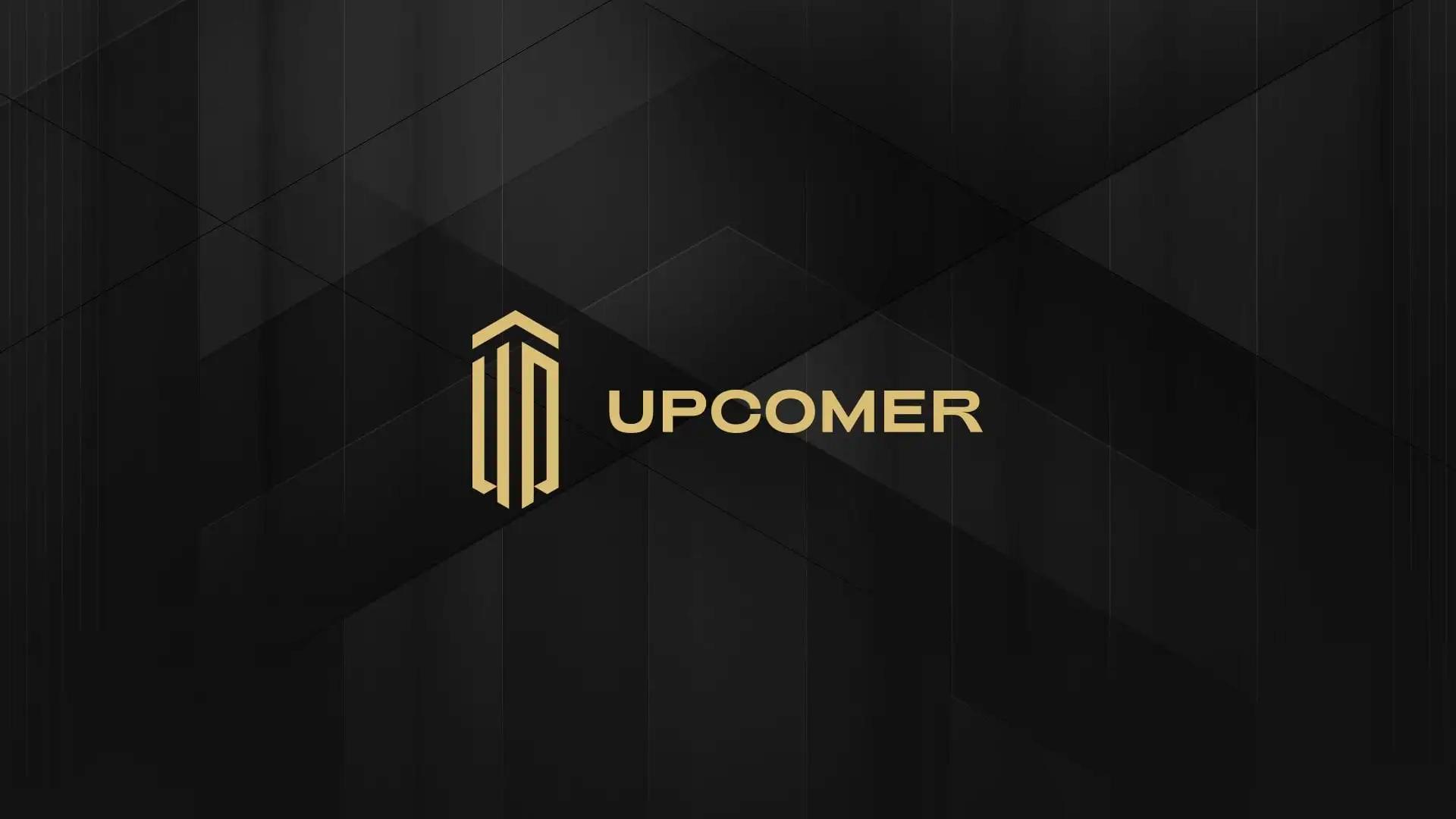 Dark image showing the Upcomer logo