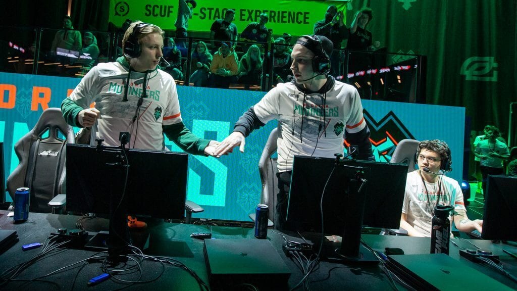 Havok low fiving Florida Mutineers teammate