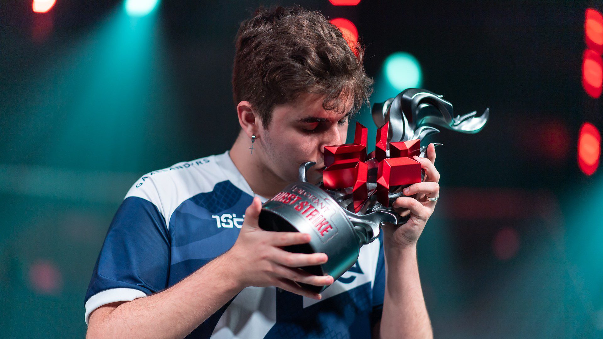 Mwzera kisses the First Strike: Brazil trophy