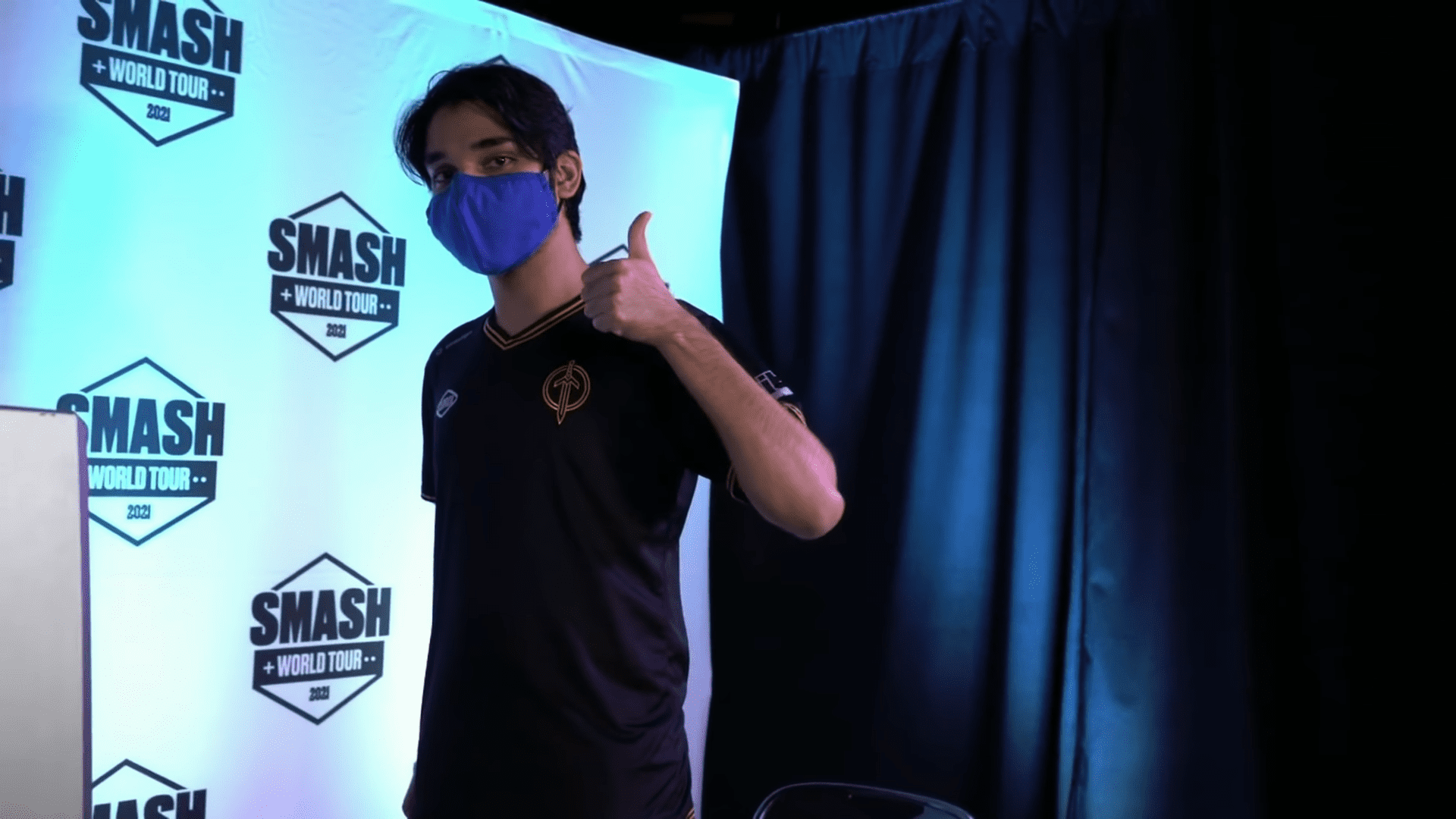 Zain gives a thumbs up after winning the SWT NA East Melee Regional Finals.