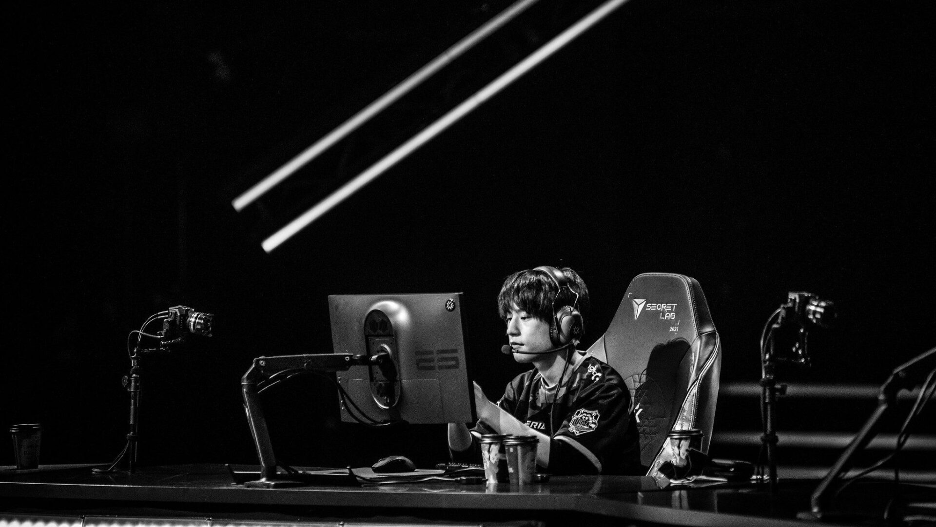 Crazy Raccoon player on stage at VALORANT Champions in black and white