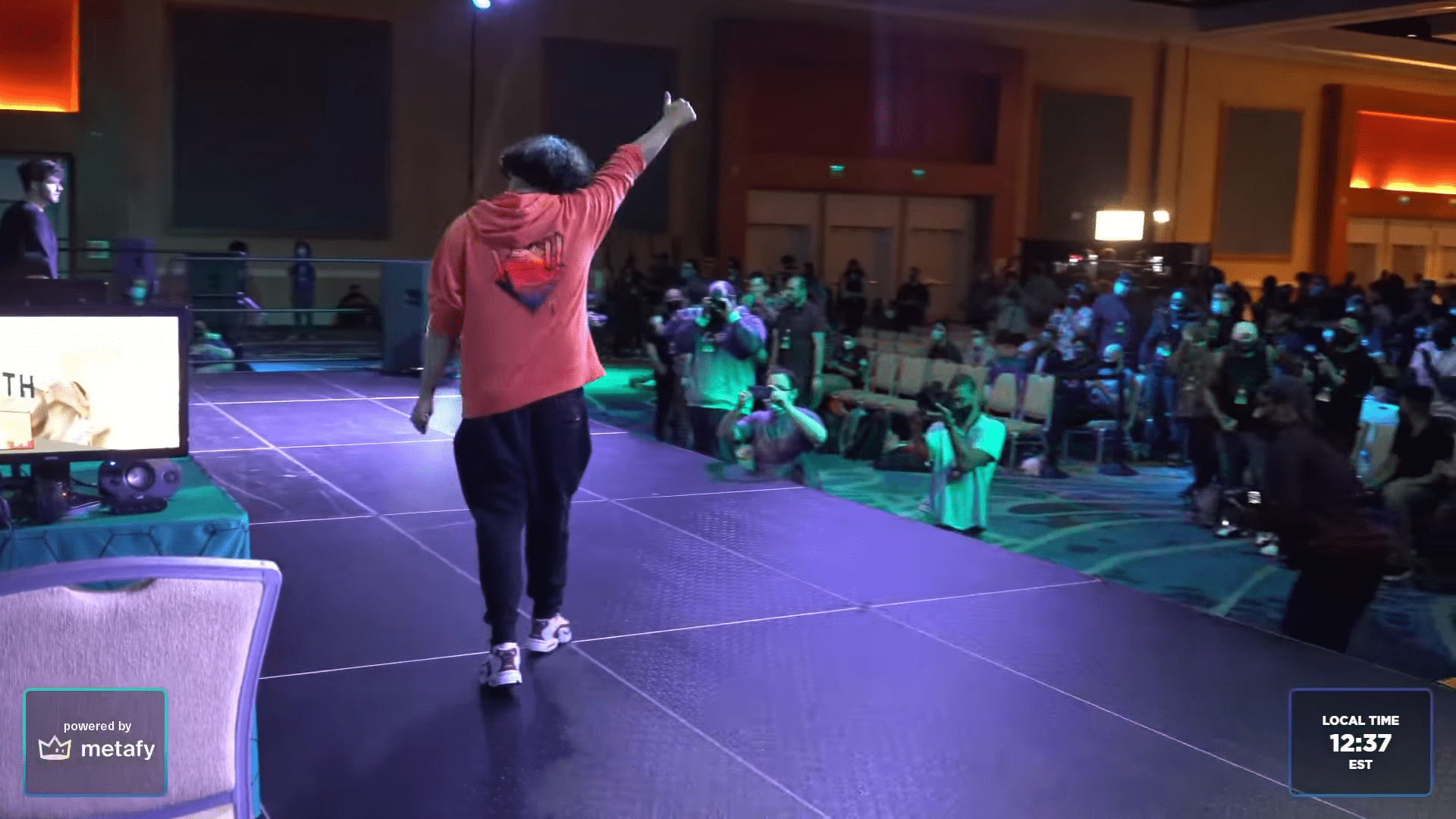 MkLeo gives the crowd a thumbs-up after winning the SWT Ultimate Championships.