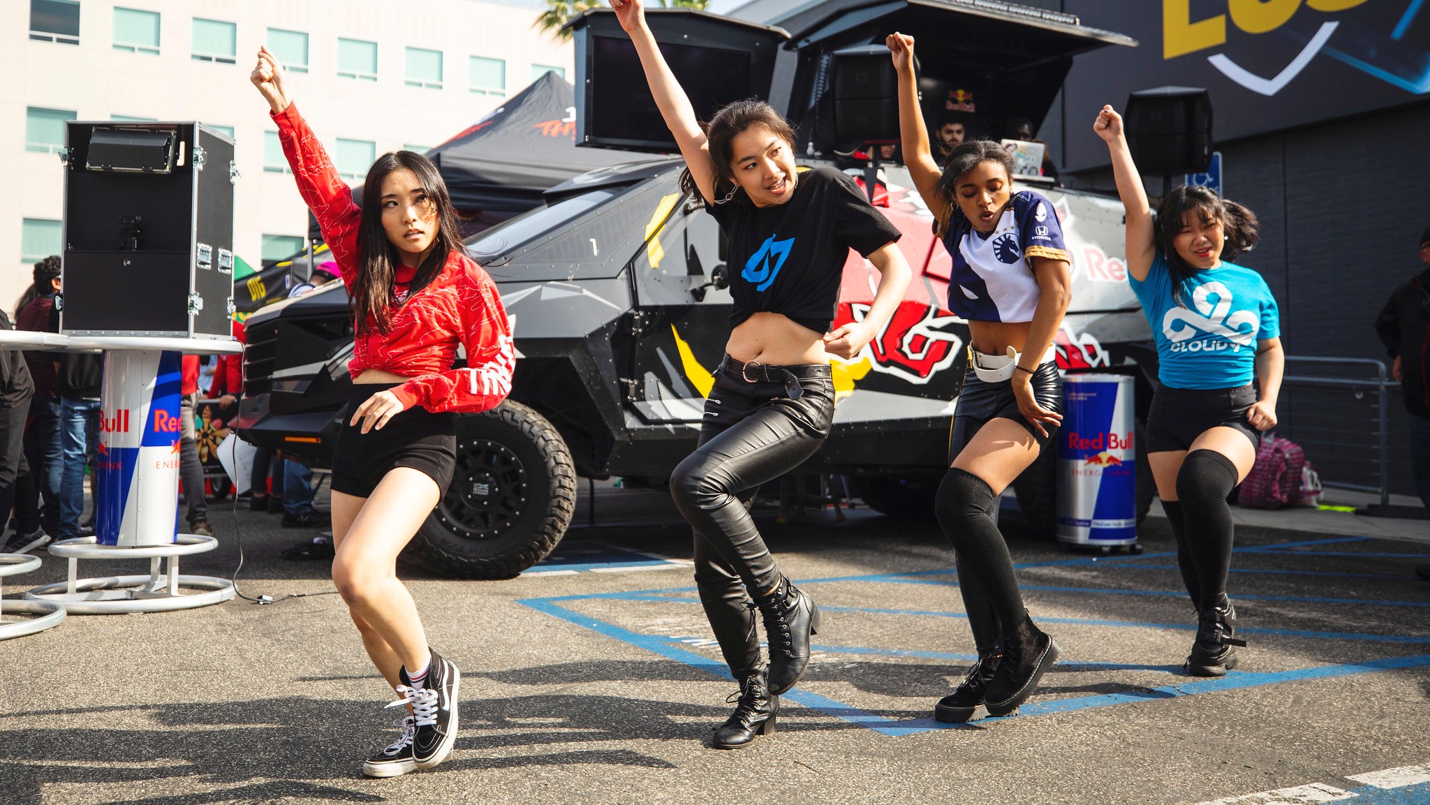 A dance squad with LCS organization logos at the LCS tailgate before Week 1 of the spring split