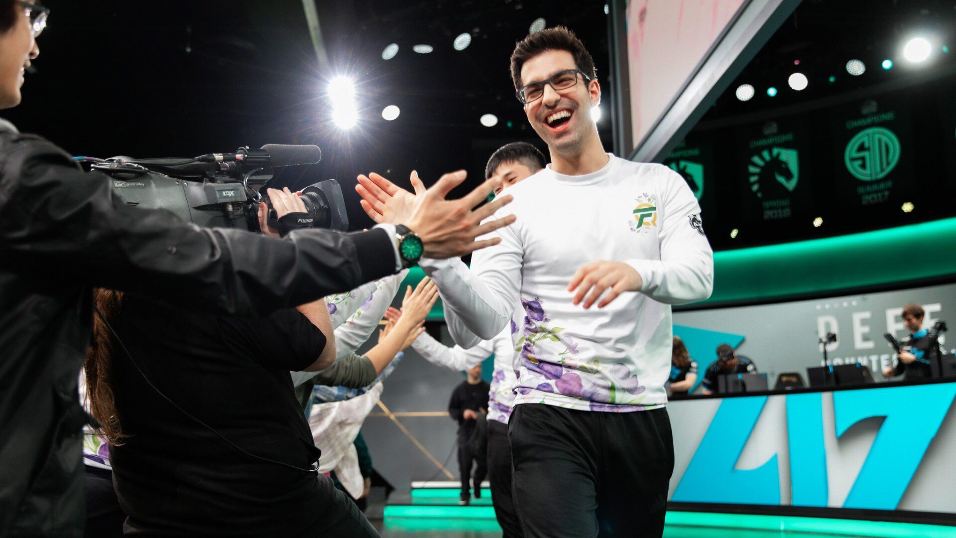 LCS studio in 2020 with players high fiving the crowd