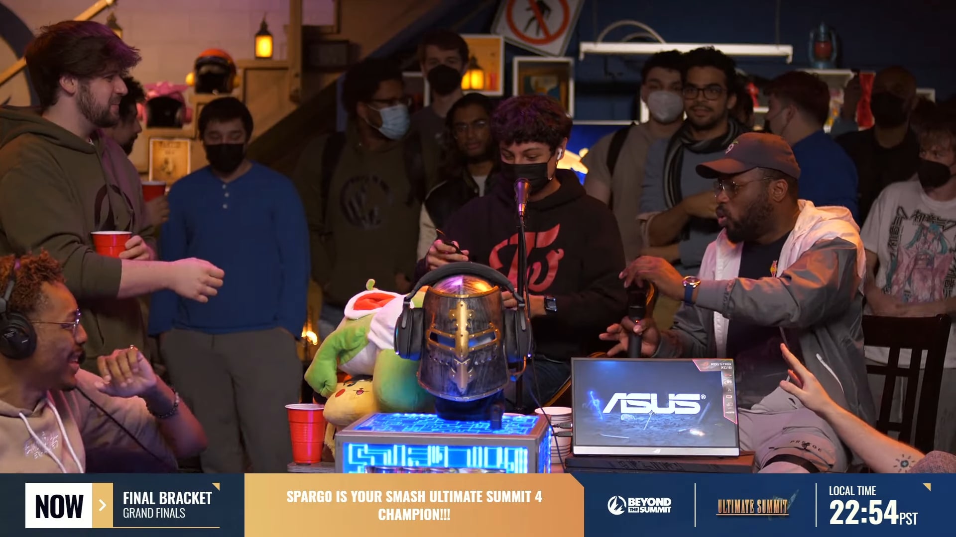 Sparg0 sheathes a knife, his trophy for winning Smash Ultimate Summit 4.