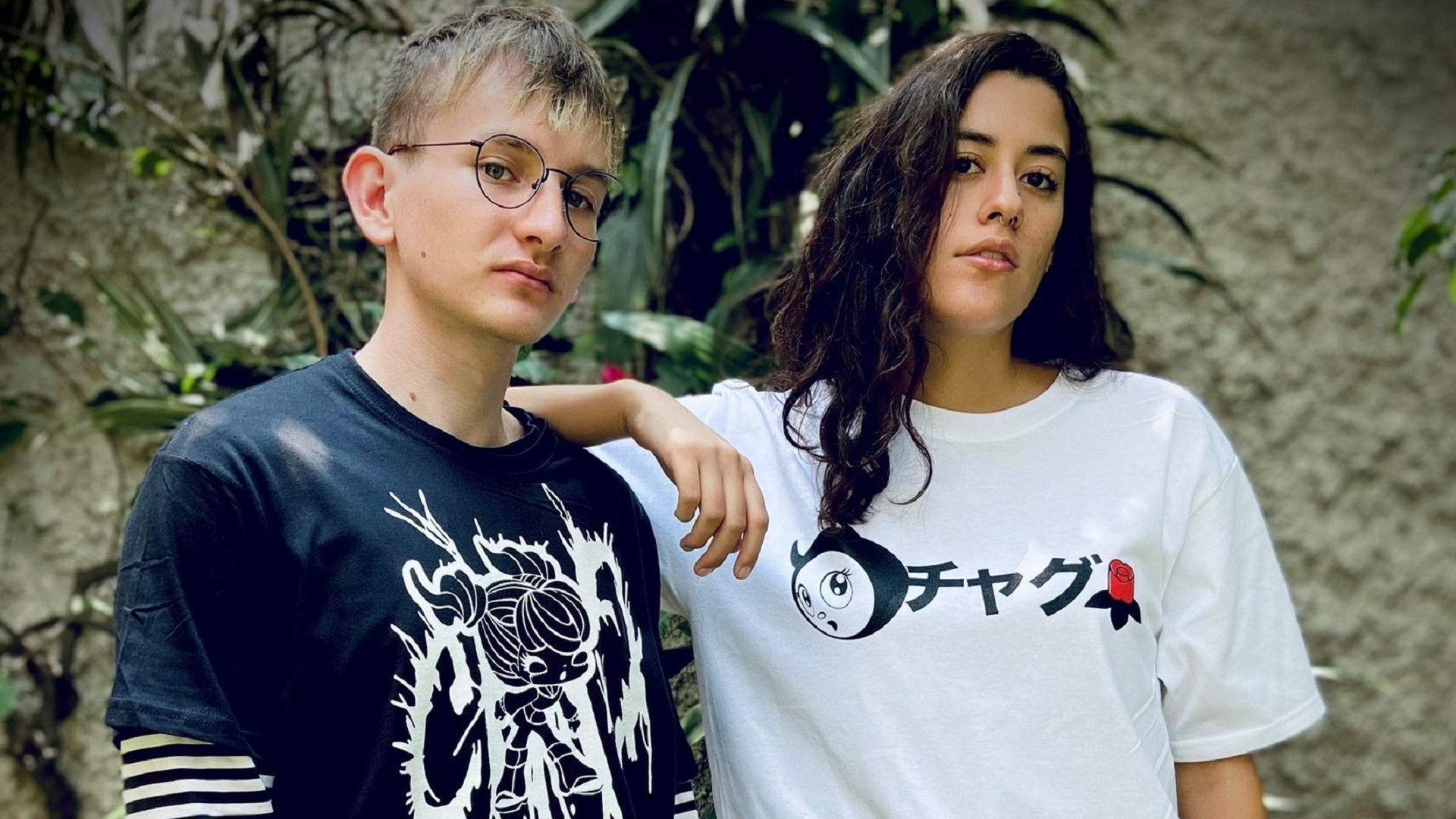 Chag and a friend sports apparel from his new clothing brand.