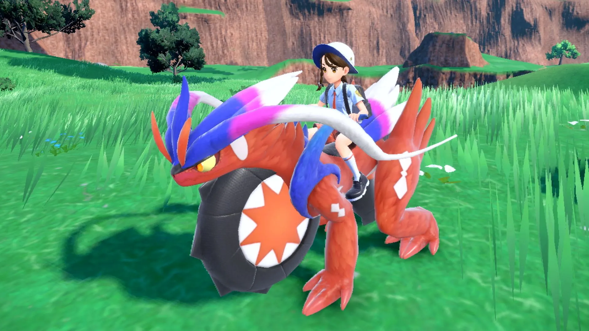 Riding Koraidon in Pokémon Scarlet and Violet