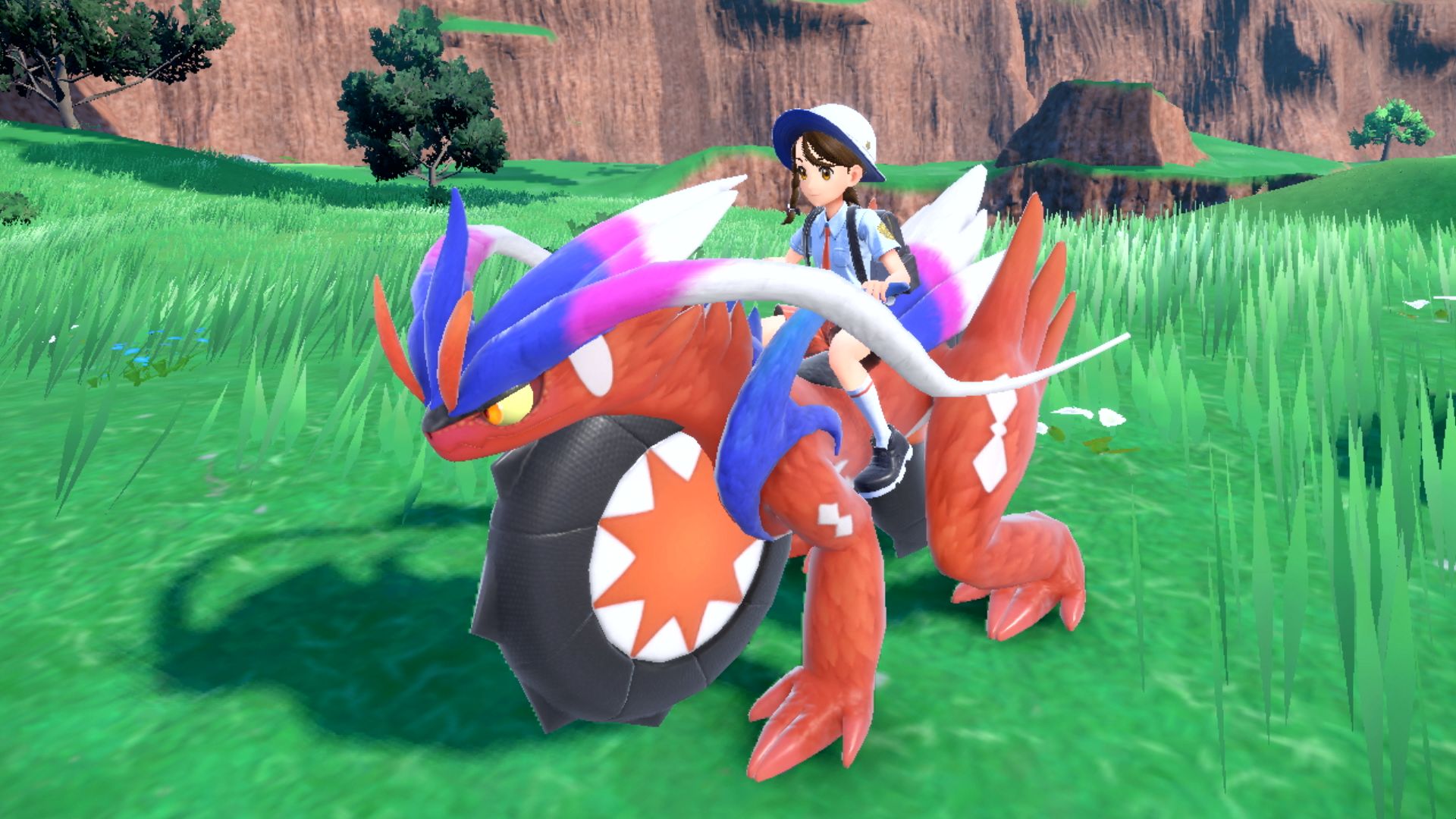 Riding Koraidon in Pokémon Scarlet and Violet