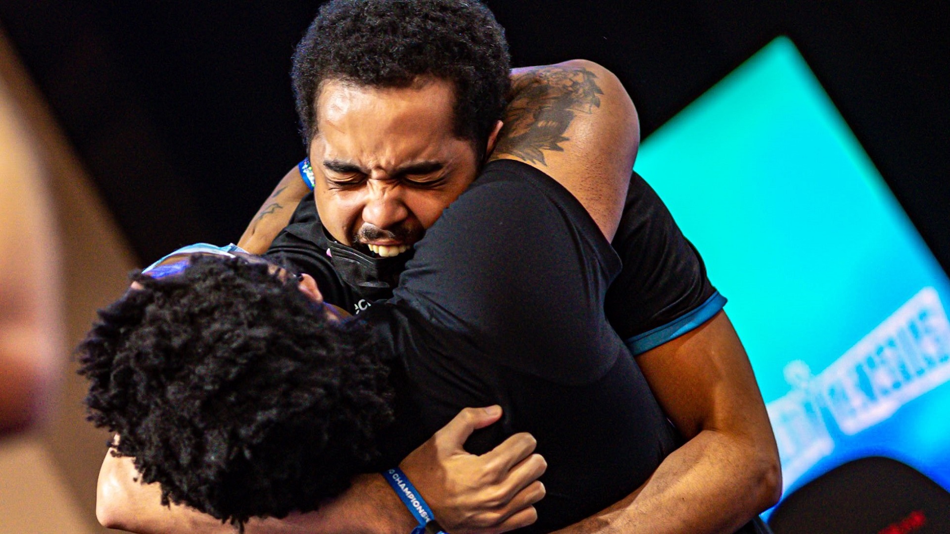 VoiD and NAKAT hug after winning Evo and staking their claim as the best MultiVersus players.