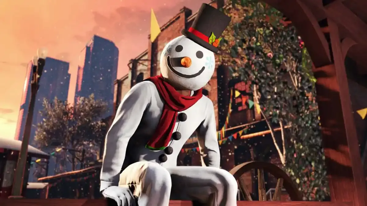 A GTA Online player sitting in a Snowman outfit in front of Christmas decorations.