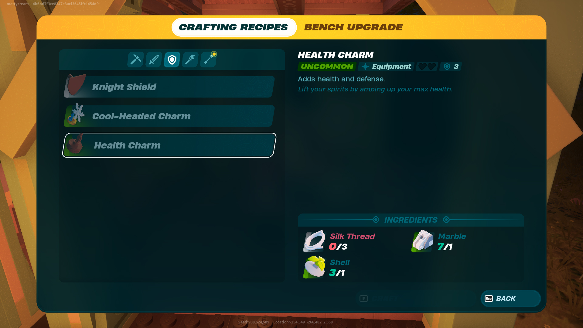 A look at the recipe for a Health Charm in LEGO Minecraft, asking for Silk Thread, Marble, and Shells.