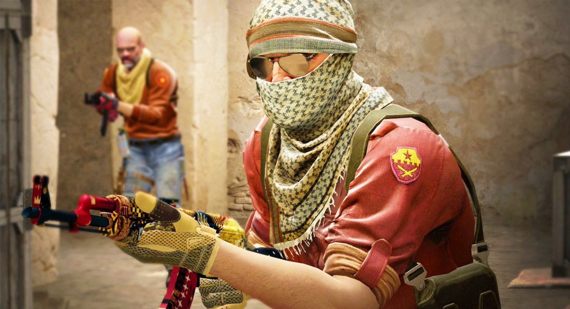 A terrorist in CS2, wearing aviator sunglasses, holding an AK-47.