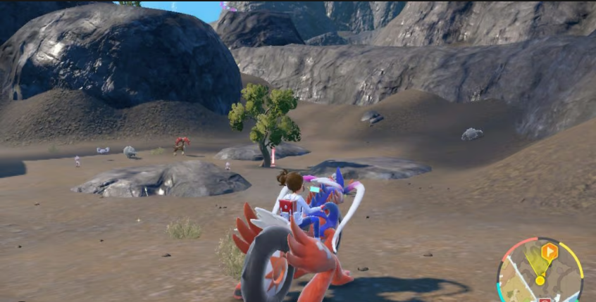 Player Character riding Koraidon exploring the Canyon Biome in the Pokémon Scarlet and Violet DLC.
