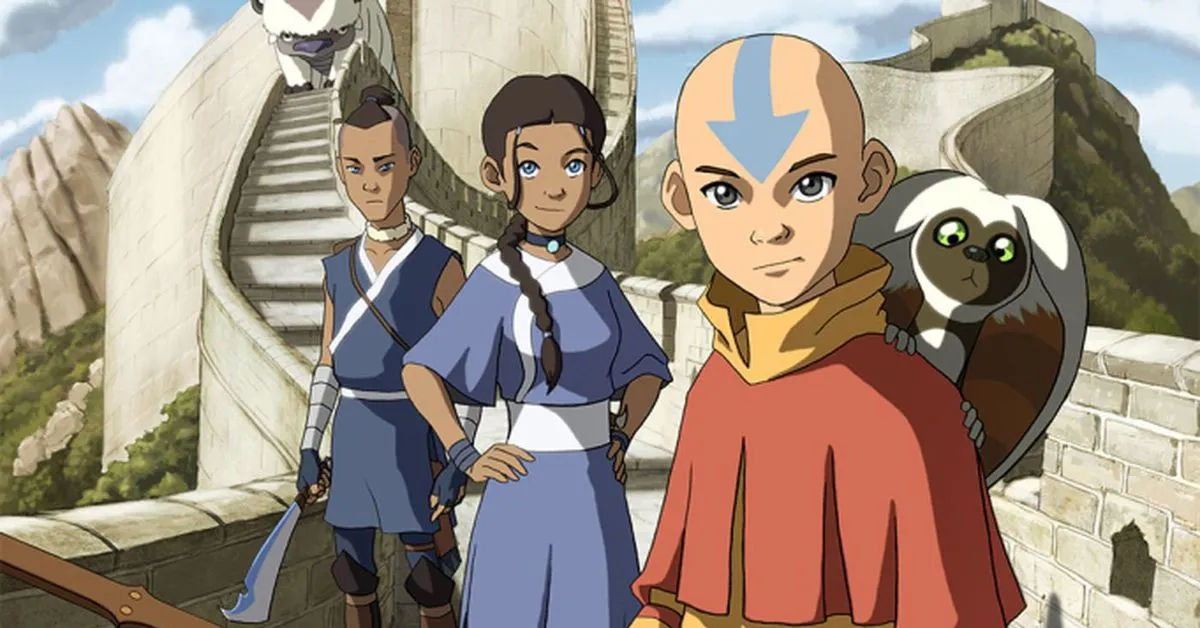 Aang, Katara, and Sokka standing on a white wall.