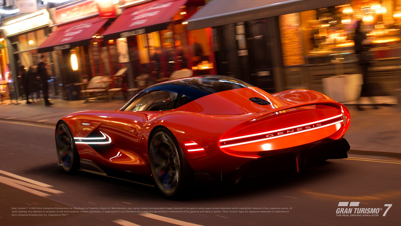 An orange Genesis X Gran Berlinetta Vision Gran Turismo, driving down a street with shops in the background.