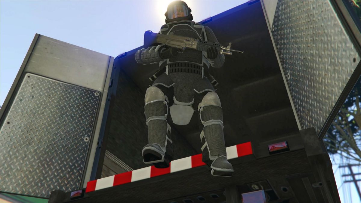 Brock Thompson jumping out of the custom Mule in heavy armor.