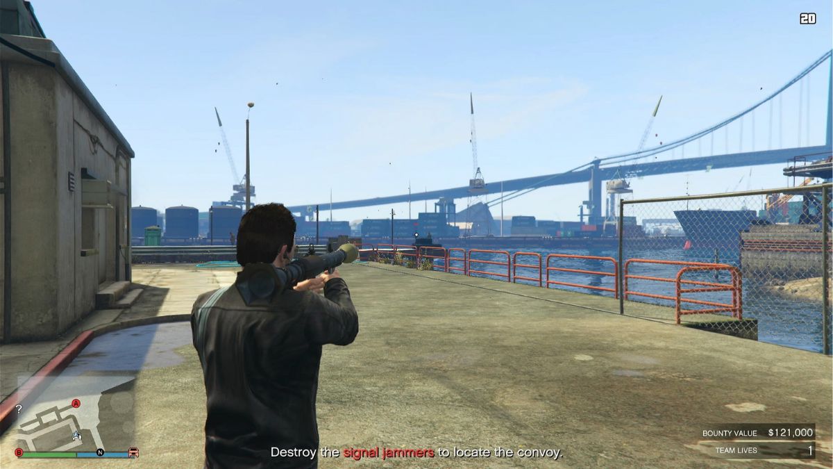GTA Online player character destroying a signal jammer on foot.