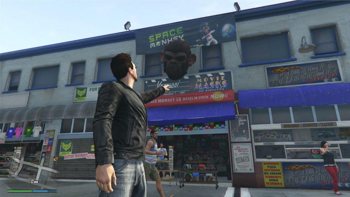 GTA Online character points to the store where characters can buy masks in GTA V and GTA Online.