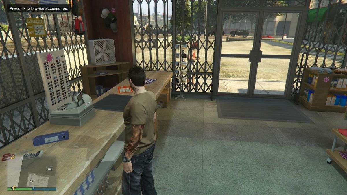 Player character showing where to buy jewelry in GTA Online at a Binco Clothing store.