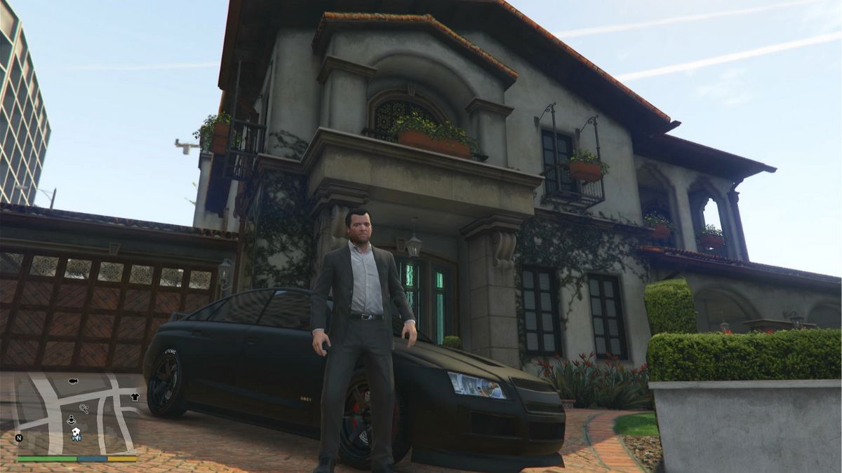 Micheal standing in front of his car and house showing the fact that he can't buy jewelry in GTA 5
