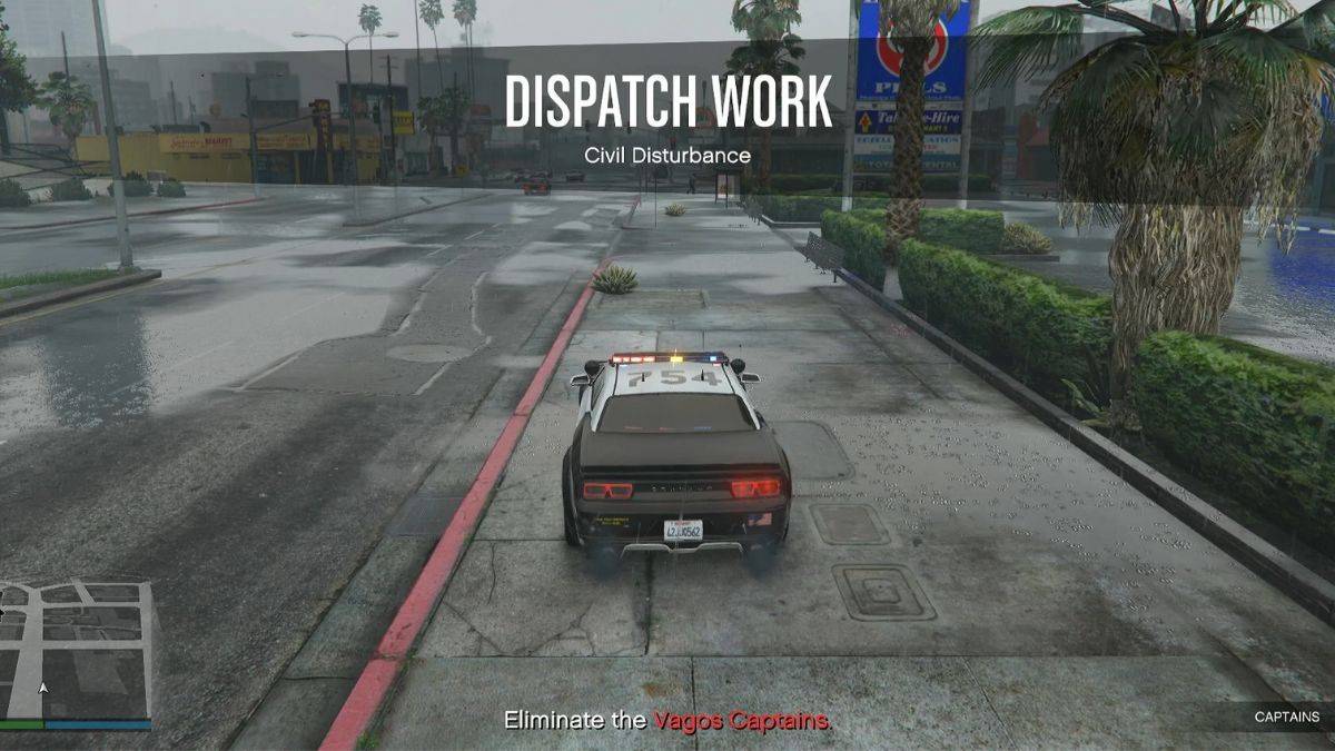 A GTA Online player starting the Civil Disturbance Dispatch mission in a police cruiser. 