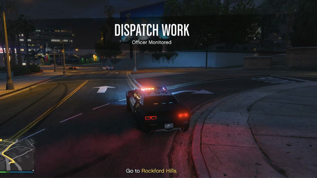 A GTA Online player starting the Officer Monitored Dispatch mission in a police cruiser. 
