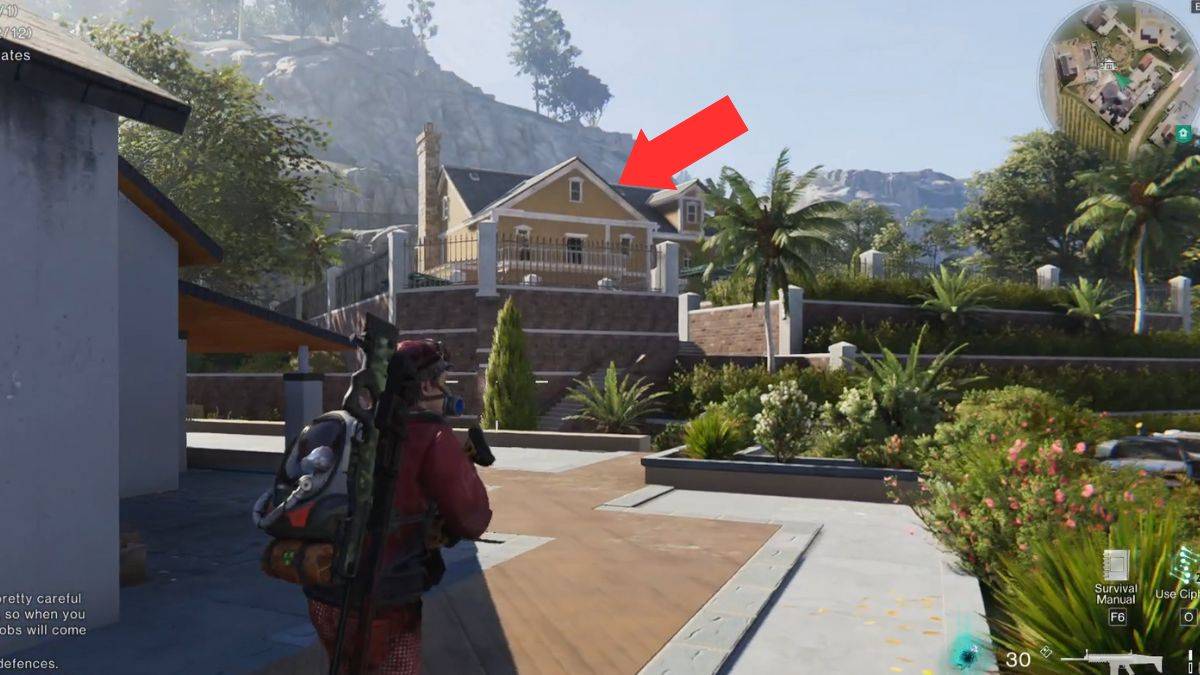 The yellow house that contains a weapon crate in Evergreen Vineyard marked by an arrow.