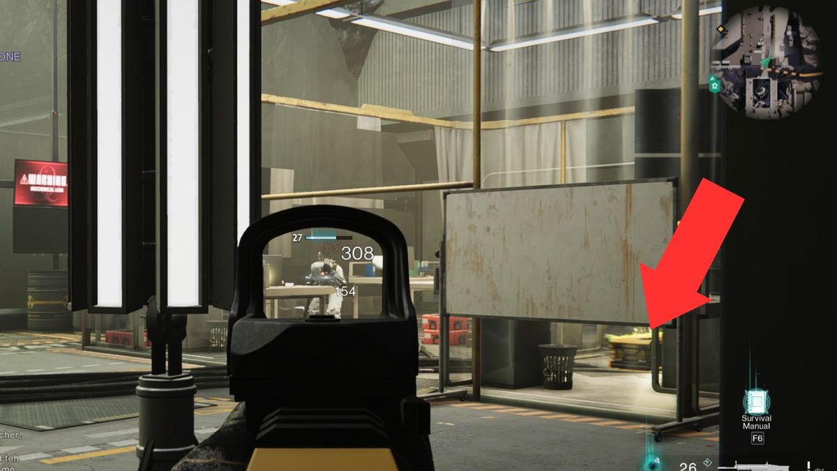 The second weapon crate at Mirage Monolith highlighted by an arrow and sitting behind a desk.