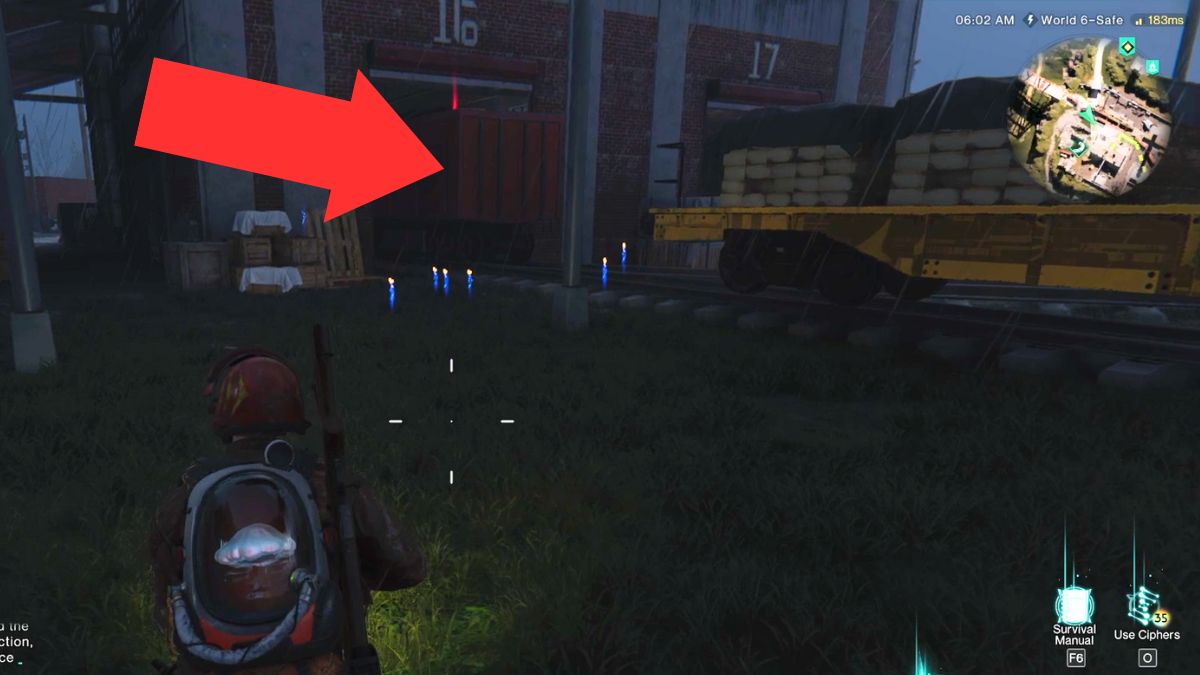 The train carriage inside of a building that contains the Mystical Chest, highlighted by an arrow.