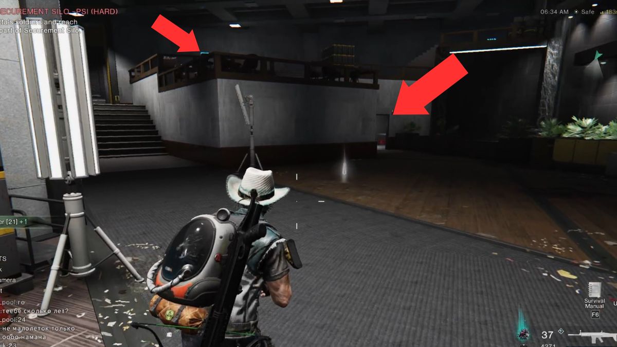 A doorway in Securement Silo PSI highlighted by an arrow as a player approaches. 
