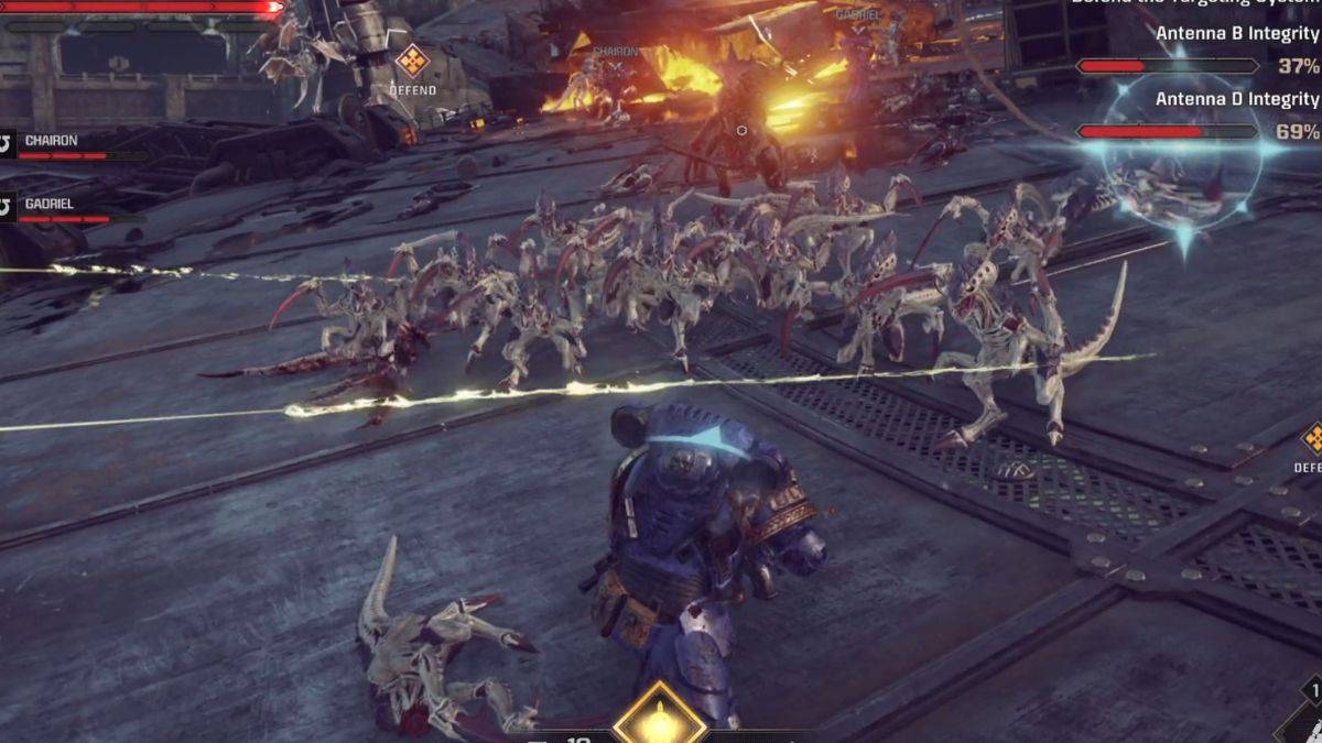 A player being attacked by a horde of enemies in the Skyfall mission while defending the antennae in Space Marine 2.