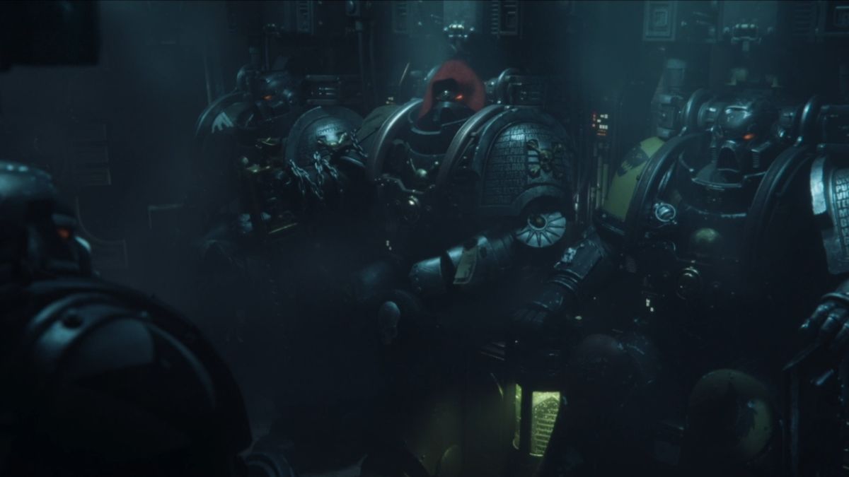 A scene depicting space marines sitting in a transport ship in Warhammer 40k: Space Marine 2.