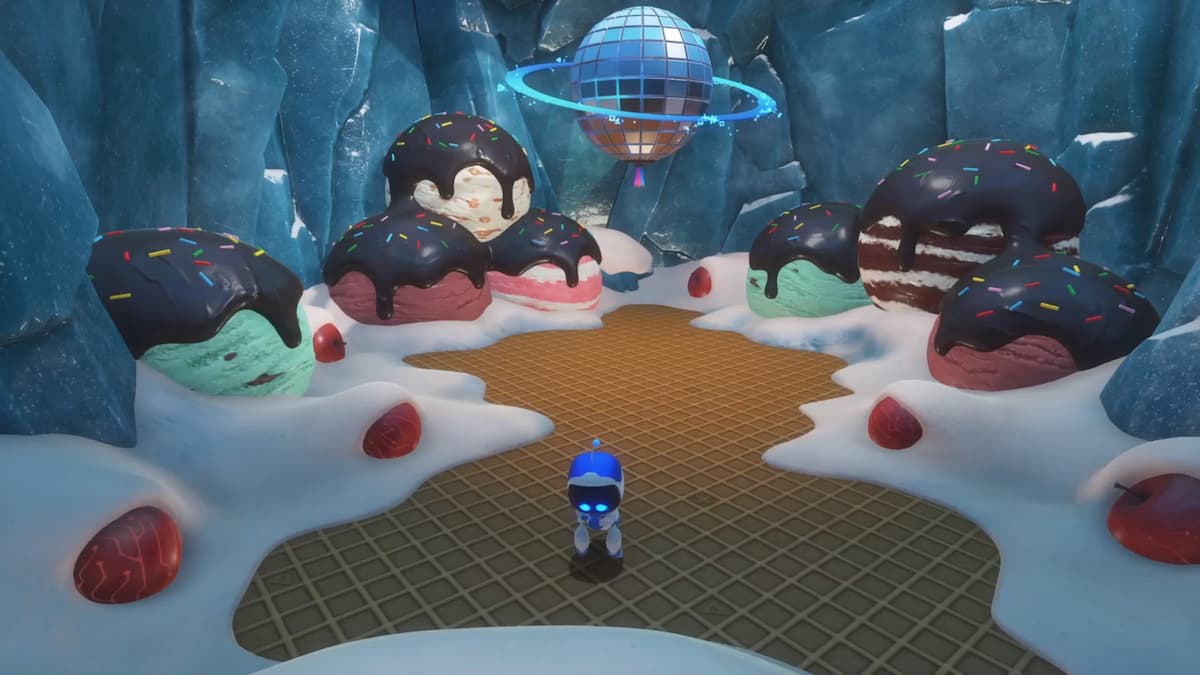 Astro Bot inside a cavern filled with ice cream scoops and toppings, complete with a shiny disco ball hanging above.