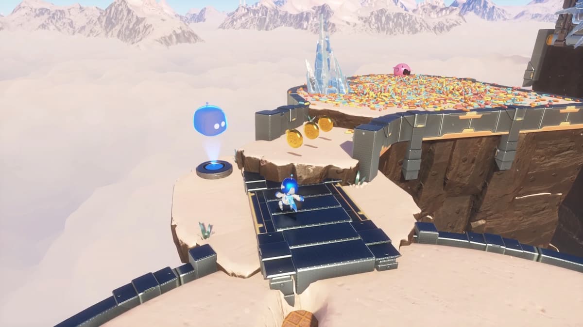 Astro Bot navigating a platform in Creamy Canyon, with the ice sculpture and a colorful sprinkle-filled area visible ahead.