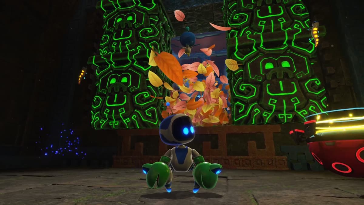Astro Bot stands before a glowing green Aztec stone carving, surrounded by floating leaves as the hidden chamber opens up.