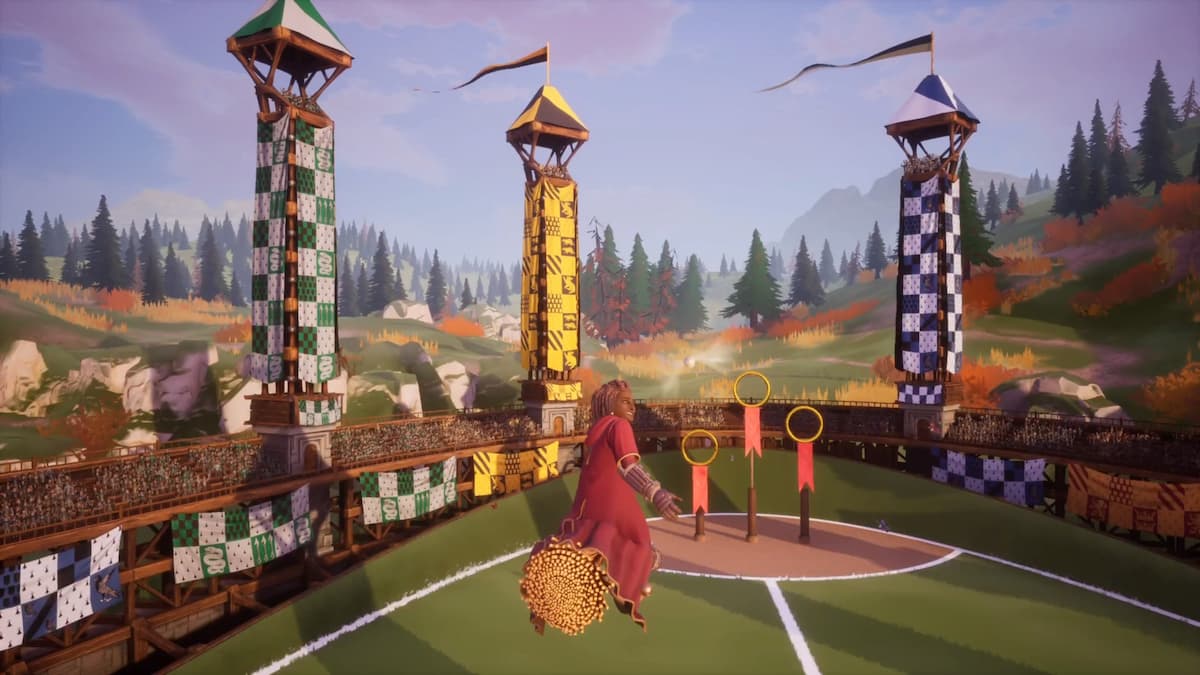 An aerial view of the Quidditch pitch, showcasing the expansive field, goalposts, and the Golden Snitch in Harry Potter: Quidditch Champions.
