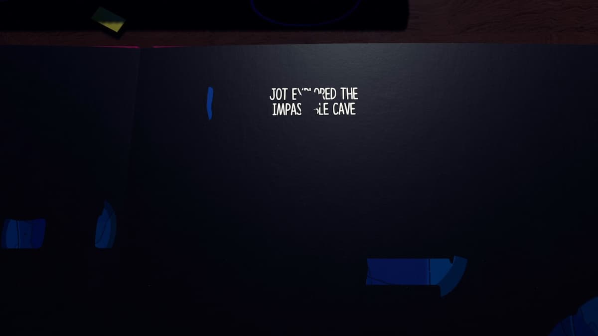 La silueta de un personaje recorre el escenario oscuro con palabras blancas de la Cueva Impasable en The Plucky Squire.