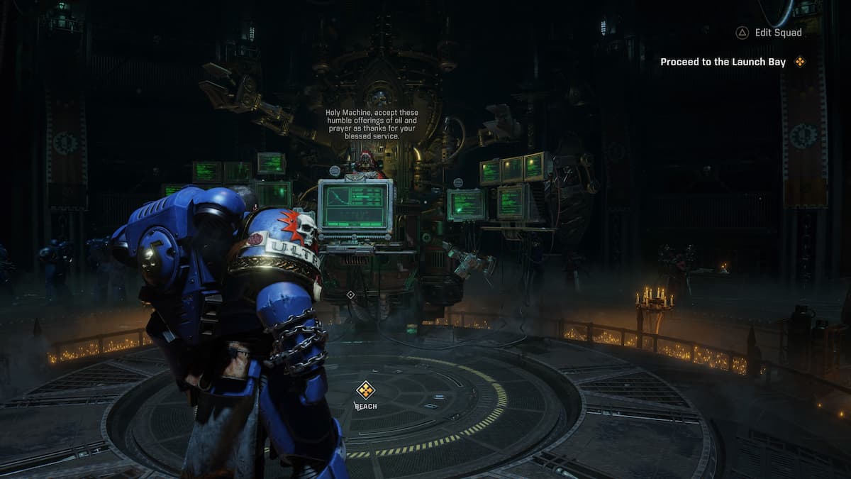 A Space Marine standing in the Armouring Hall, surrounded by tech displays and machinery. The room is dark and filled with other Space Marines.